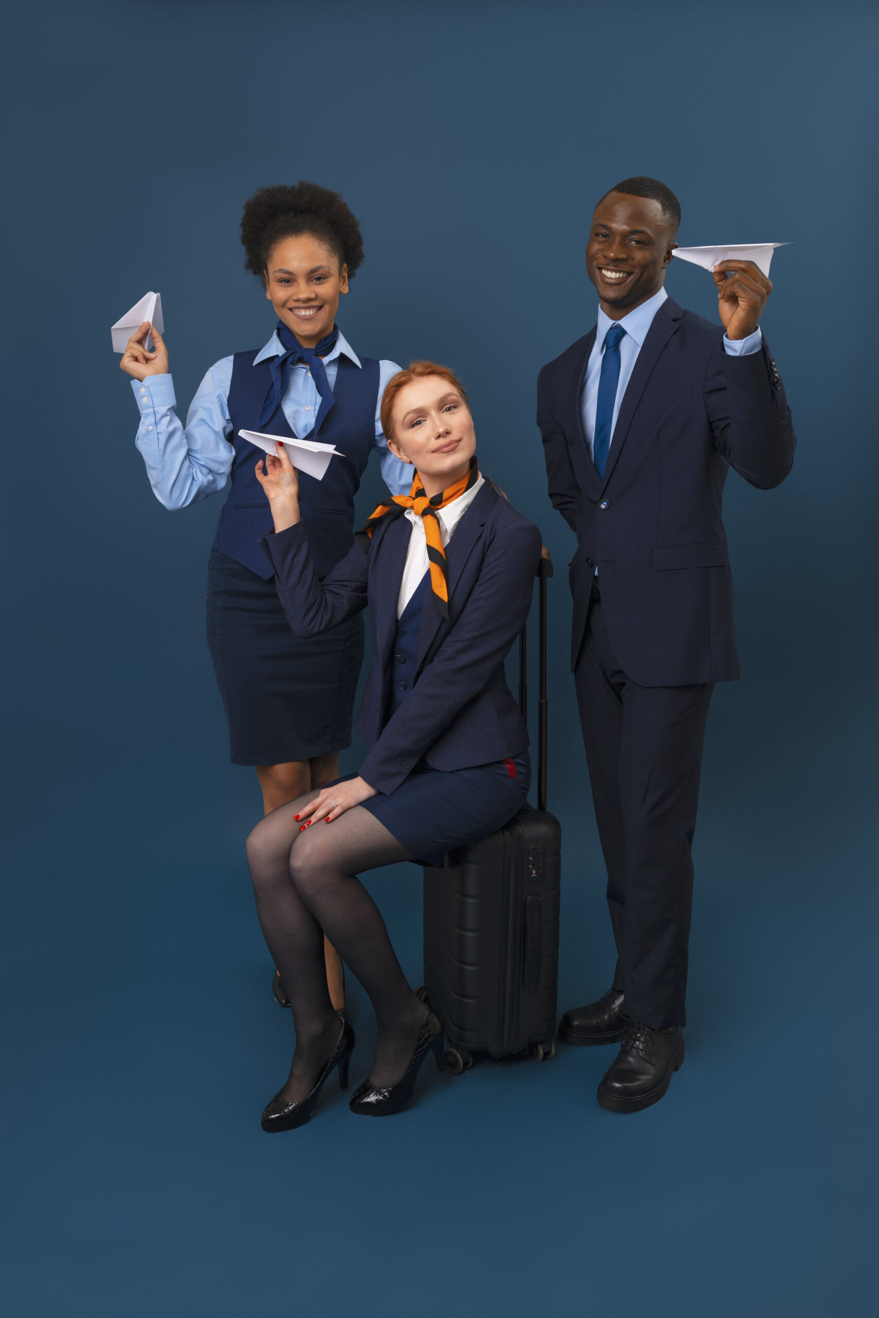 full-shot-flight-attendants-with-baggage-scaled